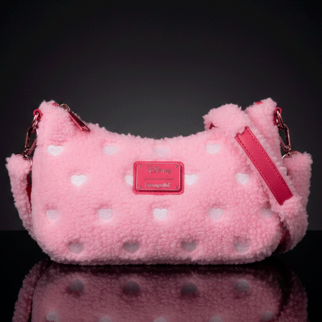 Loungefly pink sherpa crossbody bag with white heart accents and red leather details, Disney Minnie Mouse inspired design