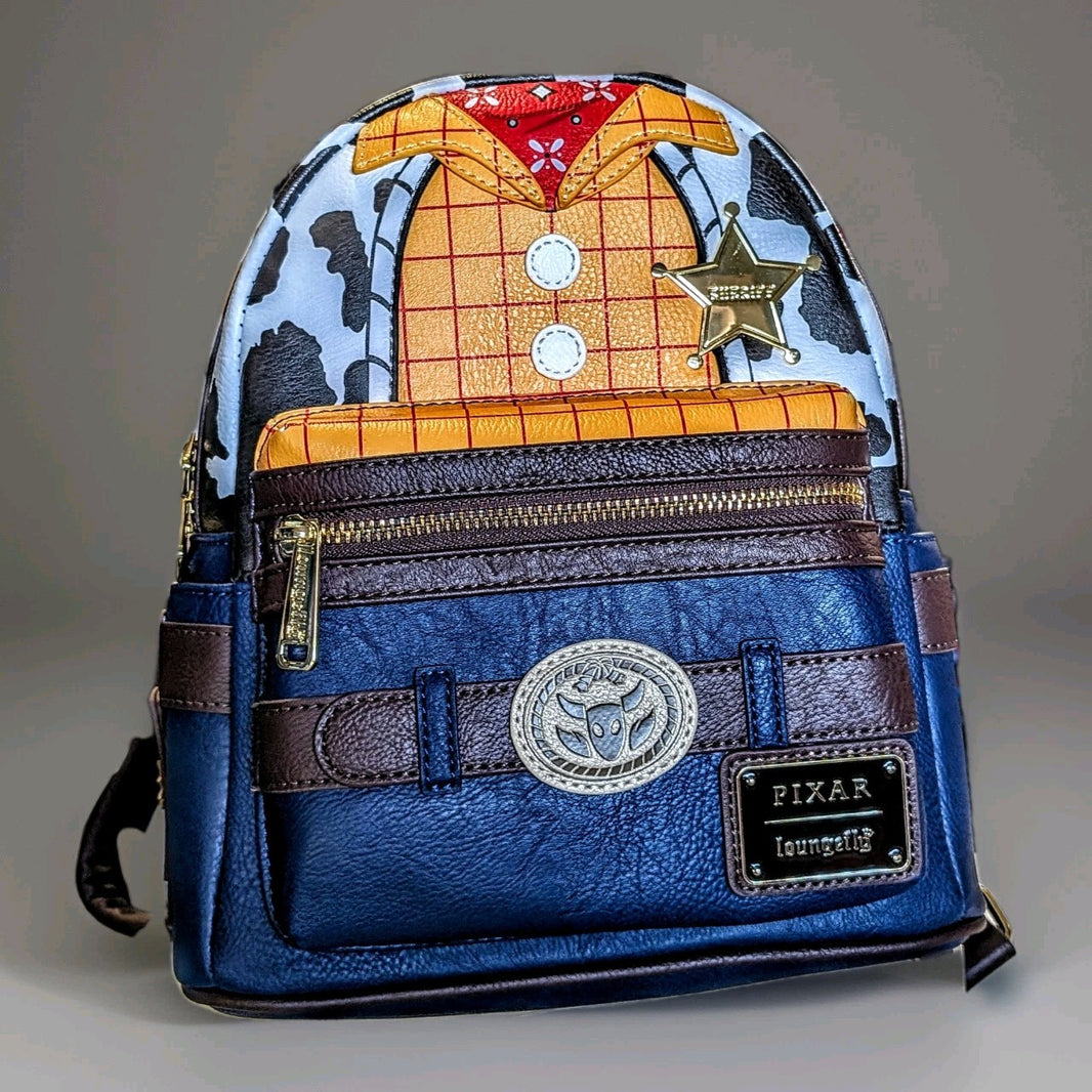 Pixar Loungefly mini backpack designed with Woody’s cowboy outfit and sheriff badge on front pocket