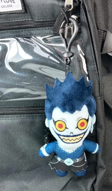Death Note Ryuk plush bag clip hanging on black backpack zipper Rarewaves collectible figure