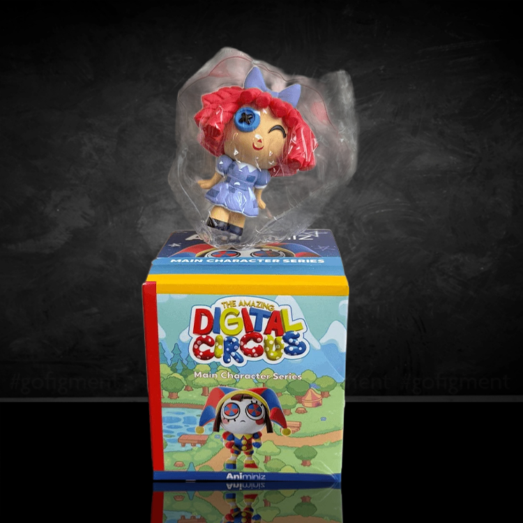 Ragatha figure from The Amazing Digital Circus by Glitch, bright red hair and cheerful expression standing on colorful box