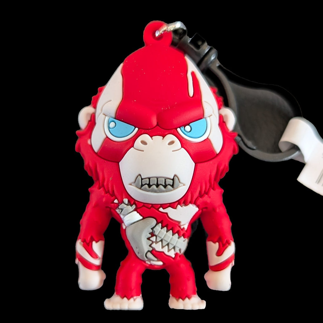 Monogram limited edition 3D foam Scar King keychain from Godzilla vs Kong, vibrant red and white design, 3 inches tall.