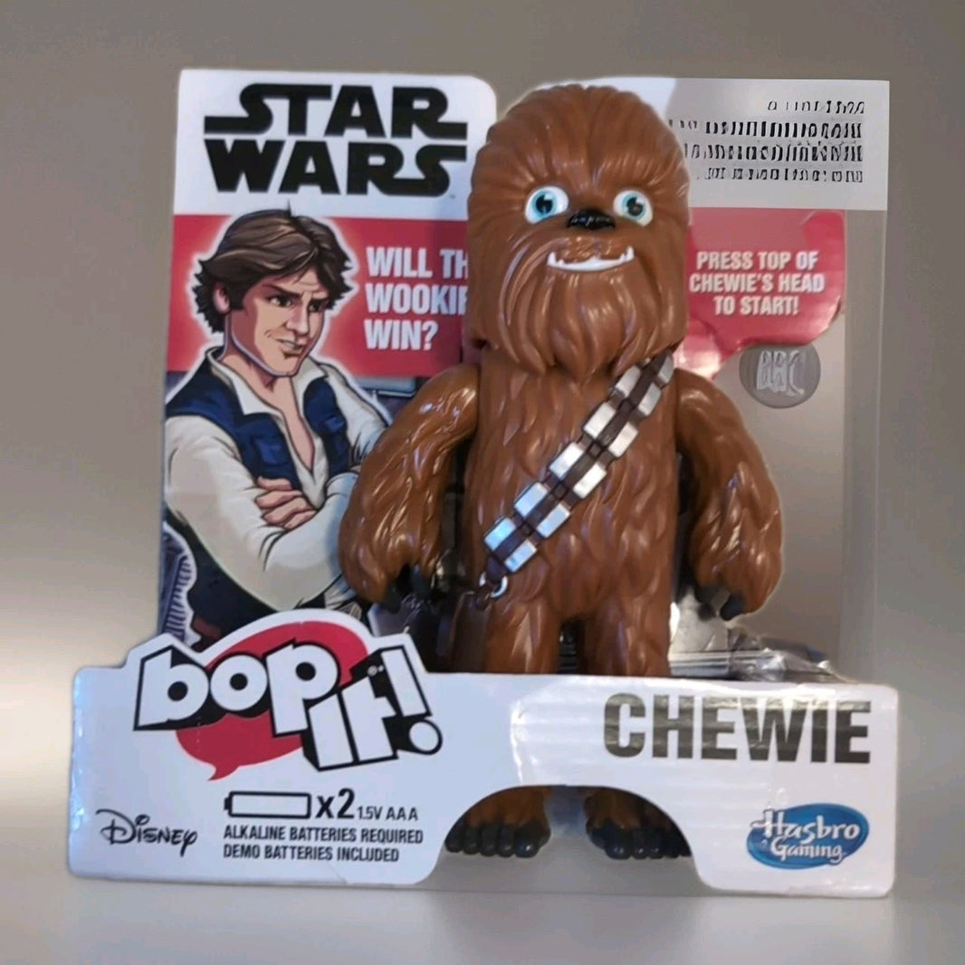 Hasbro Gaming Star Wars Bop It Chewbacca electronic game figure with packaging featuring Han Solo artwork