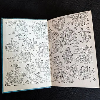 Open hardcover Hardy Boys book showing black-and-white illustrated endpapers with mystery scenes from The Clue of the Broken Blade