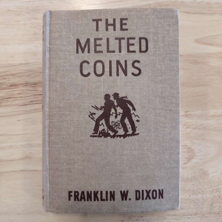 23 The Melted Coins (Brown): Vintage Hardy Boys Book image 0