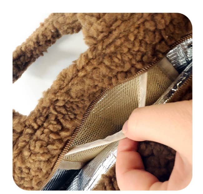 K-Wonderland Monchhichi lunch tote with soft teddy-fleece exterior and insulated interior shown partially open