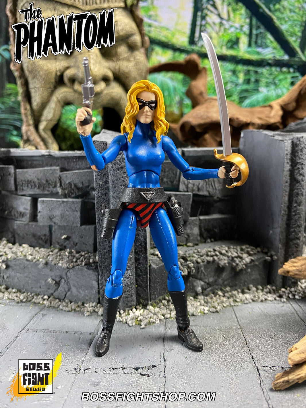 Boss Fight Studio Llc Julie Walker figure in blue suit with sword and pistol posed in ancient stone ruins diorama setting