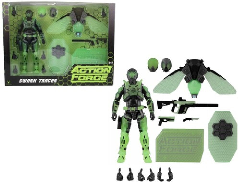 Green and black action figure with wings, weapons, alternate hands, and boxed accessories