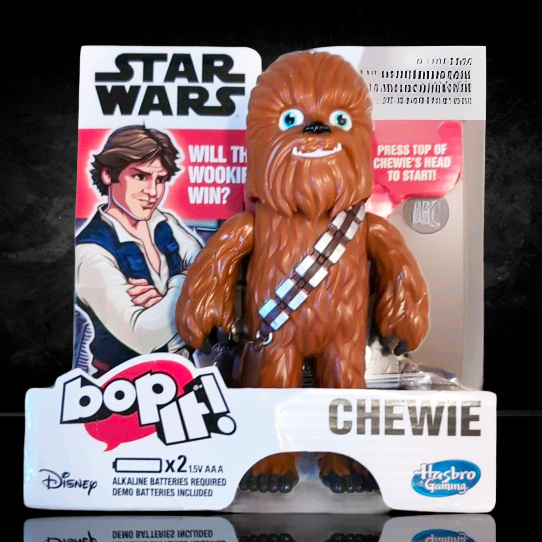 Hasbro Gaming Bop It Star Wars Chewbacca electronic game figure in original packaging with character art background