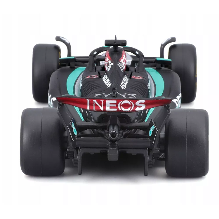 Bburago die-cast 1:43 scale Mercedes W15 George Russell 63 model car front view with detailed livery and helmet.