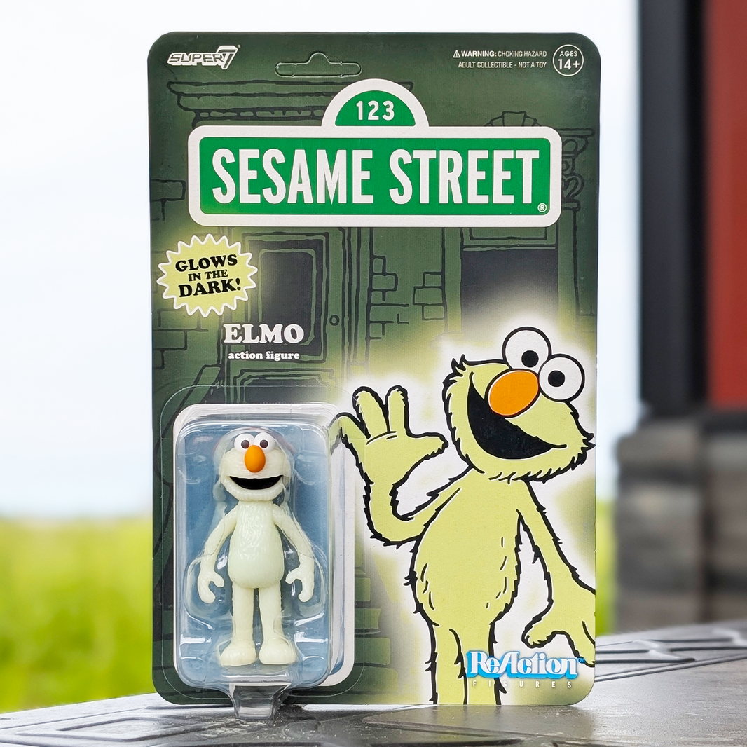 Elmo Glow ReAction Figure Exclusive – Sesame Street 3.75" Super7 Collectible