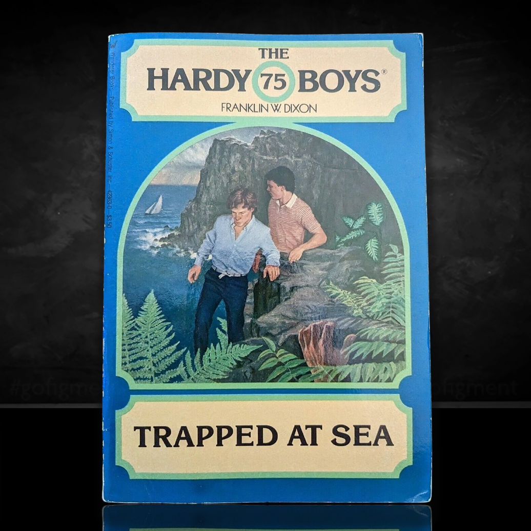 Image of a Hardy Boys Paperback book featuring 75 Trapped at Sea - The Hardy Boys Paperback Book - Vintage 1982