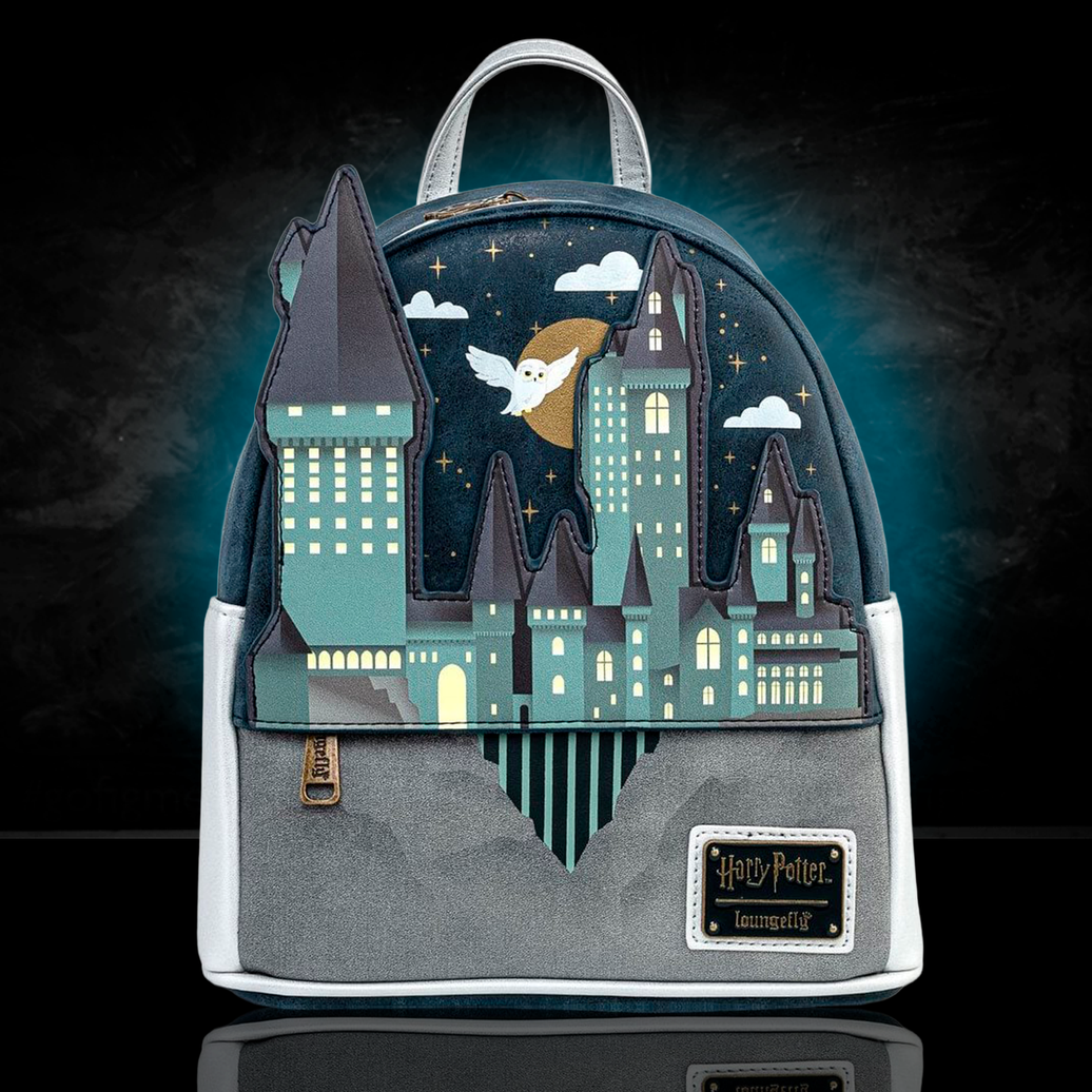 Loungefly mini-backpack featuring illuminated Hogwarts Castle design with flying owl and starry night sky background