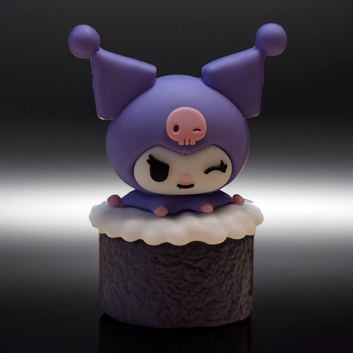 Go Figment Hello Kitty and Friends figure featuring Kuromi character winking atop textured sushi roll base with white topping