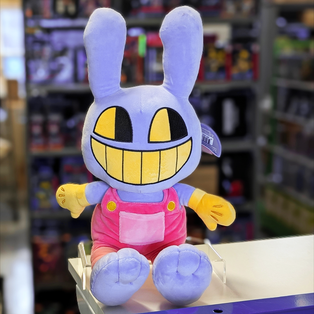 Glitch Jax plush toy in purple with yellow gloves and pink overalls from The Amazing Digital Circus collection standing on display