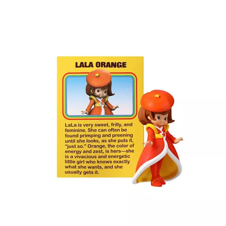 Lala Orange collectible figure in orange outfit with beret, standing next to a character description card from Rainbow Brite series.