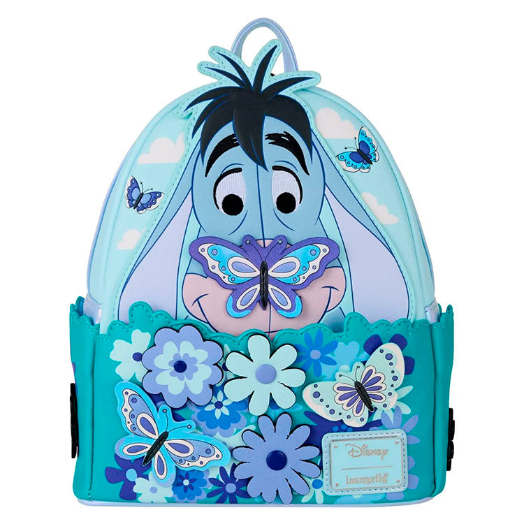 Loungefly mini-backpack featuring Eeyore with butterflies and spinning flowers in blue and purple tones