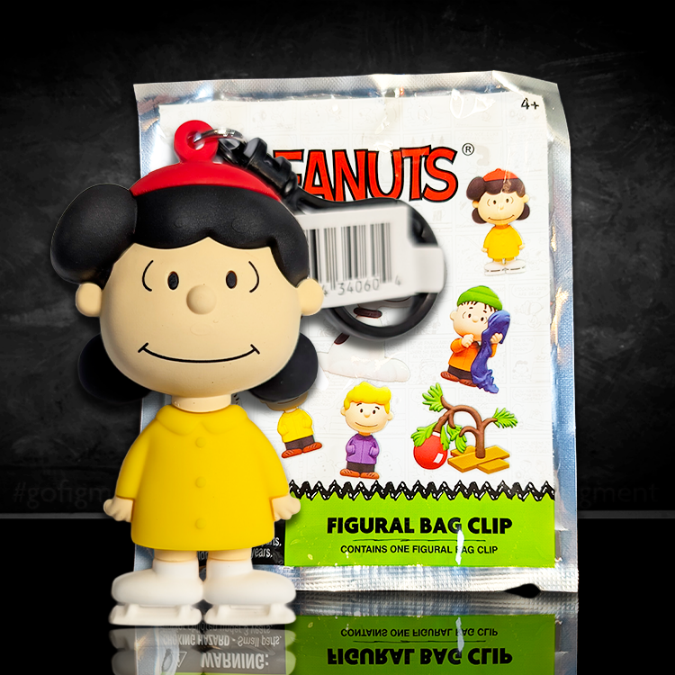 Monogram Peanuts Series 4 Lucy Van Pelt figural bag clip in yellow coat and red hat with packaging