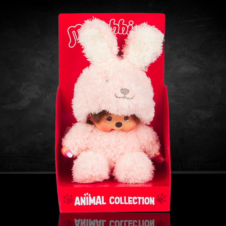 Sekiguchi Monchhichi 7-inch plush doll in a pink fluffy bunny costume sitting in red display box.