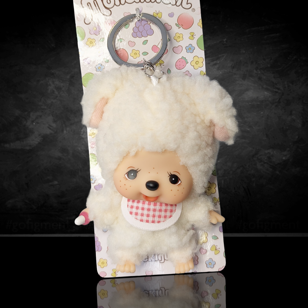 Official Sekiguchi 4-inch Monchhichi keychain featuring the Chamu Sheep mascot plush, often searched as a Monchichi bag charm.