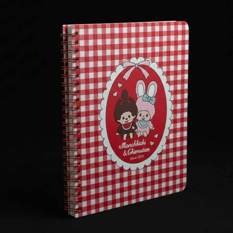 Go Figment Monchhichi and Chimutan besties reusable sticker book with red gingham cover and spiral binding on black background