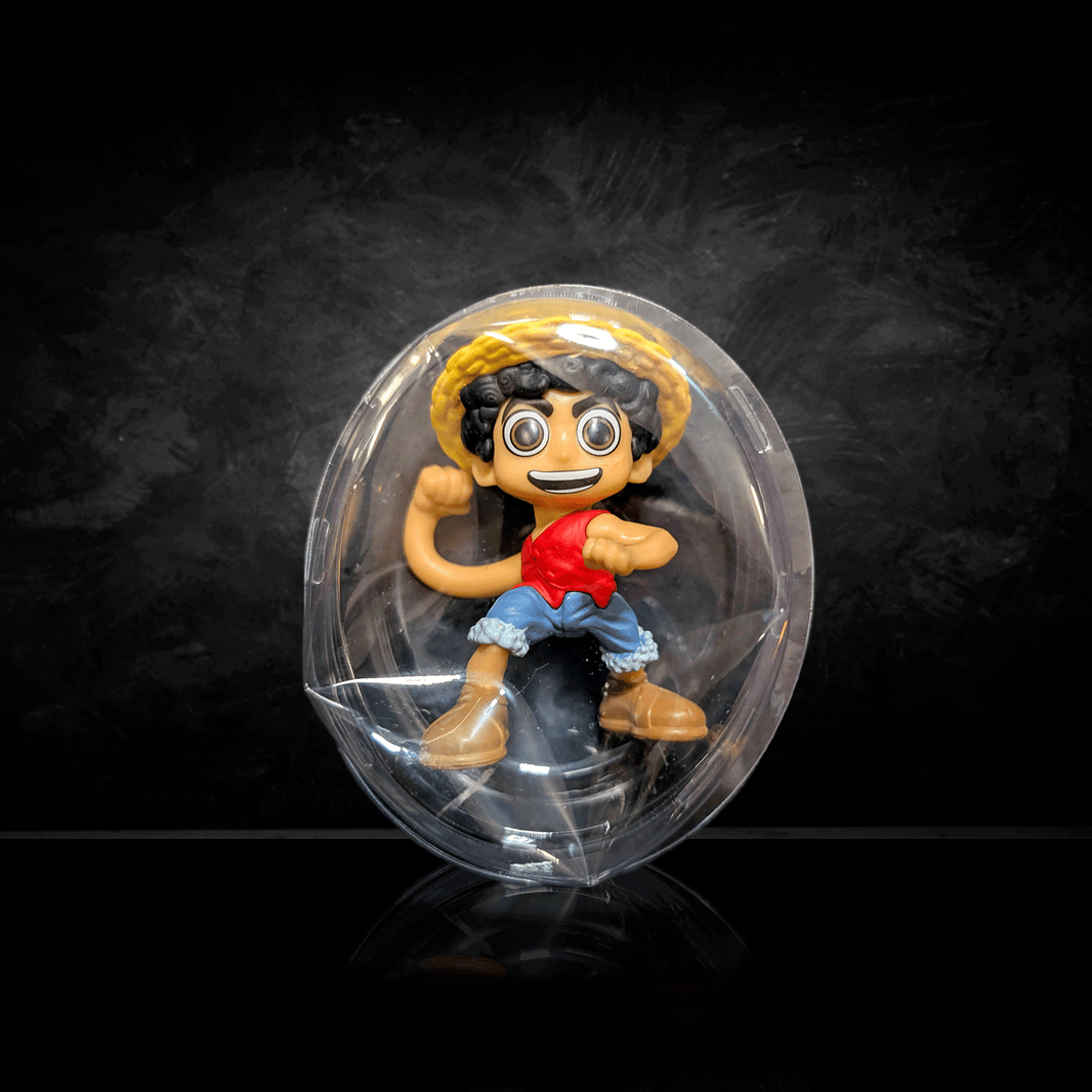 Go Figment One Piece mini figure of Monkey D. Luffy in blind box packaging for collectors and fans