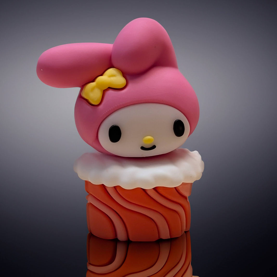 Go Figment Hello Kitty and Friends sushi collectible capsule featuring My Melody character with pink hood and yellow bow
