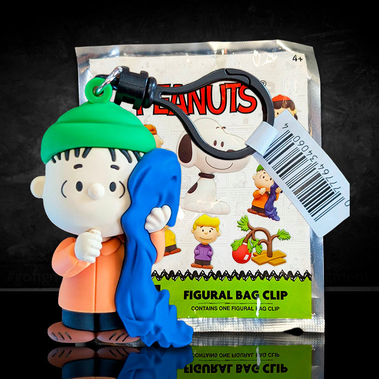 Monogram Peanuts Series 4 Linus Van Pelt figural bag clip with purple blanket and packaging backdrop