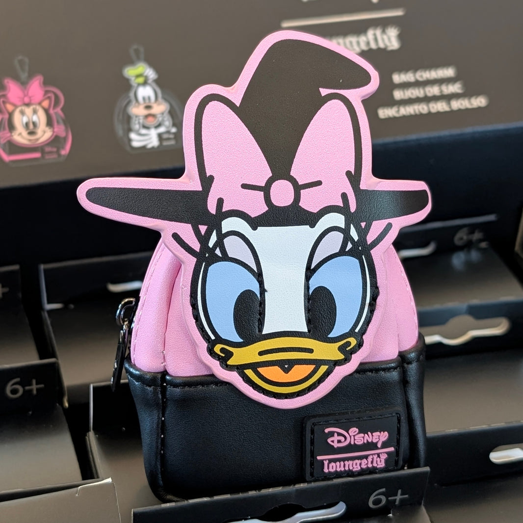 Disney Loungefly Witch Daisy Duck mini backpack charm in pink and black with a zipper and witch hat detail