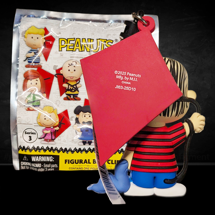 Linus bag clip holding blue blanket and red kite from Peanuts 75th Anniversary Series 3 by Monogram