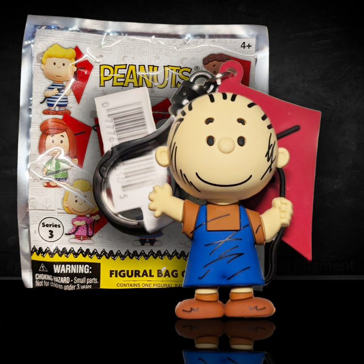 Monogram Pig-Pen 3D foam bag clip from Peanuts 75th Anniversary Series 3 holding a red kite with dirt marks