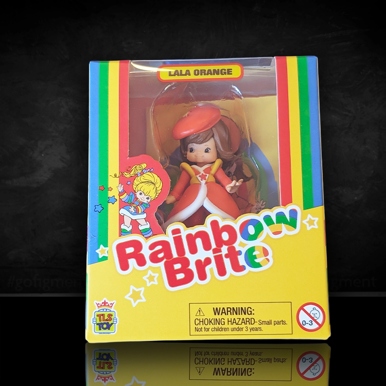 Rainbow Brite Lala Orange 2.5-inch collectible figure in bright orange outfit with retro packaging display.