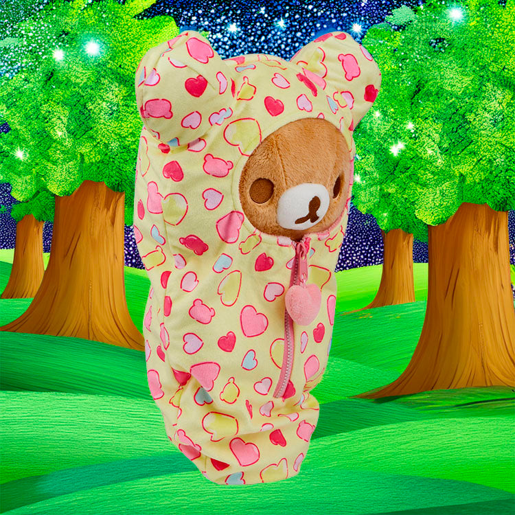 Rilakkuma plush sleeping bag with yellow hearts and zipper by San-X, perfect for cozy naps and cuddles.