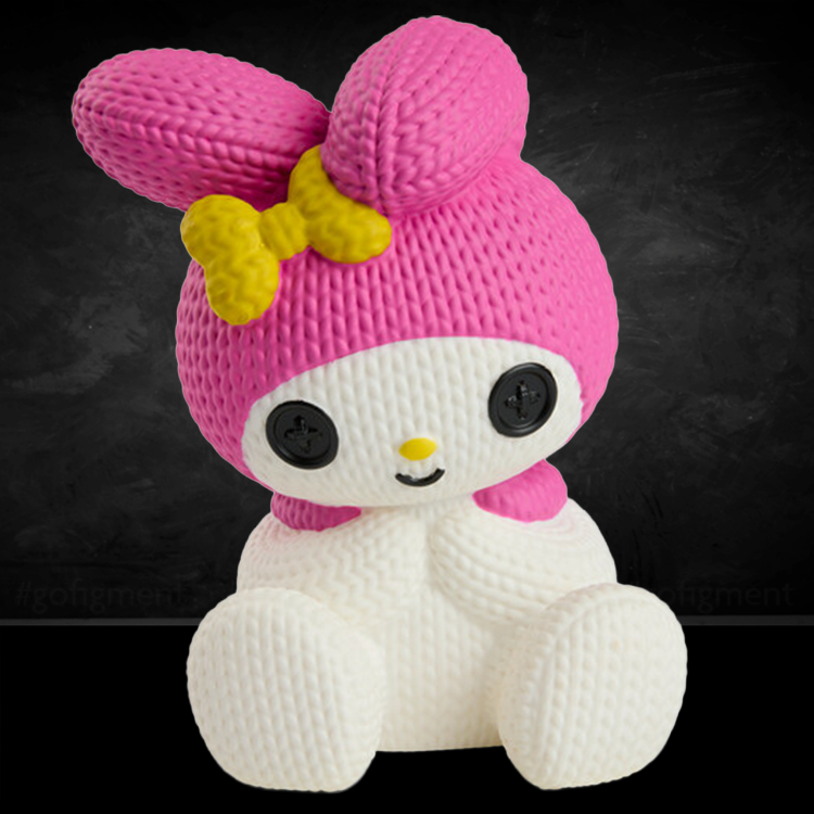 Handmade by Robots vinyl figure of My Melody in knit-inspired texture with pink hood and yellow bow detail.