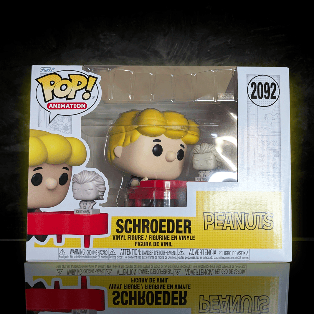 Funko Pop! Peanuts Schroeder figure playing piano in original window box packaging with collectible design