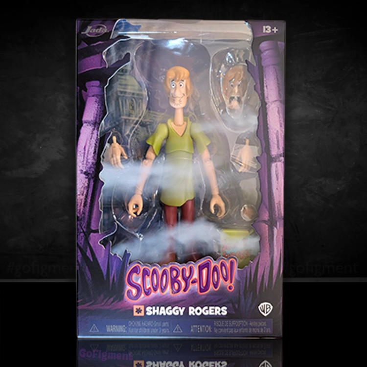 Shaggy Rogers action figure by Jada Toys in Scooby-Doo packaging with extra hands and heads accessories visible