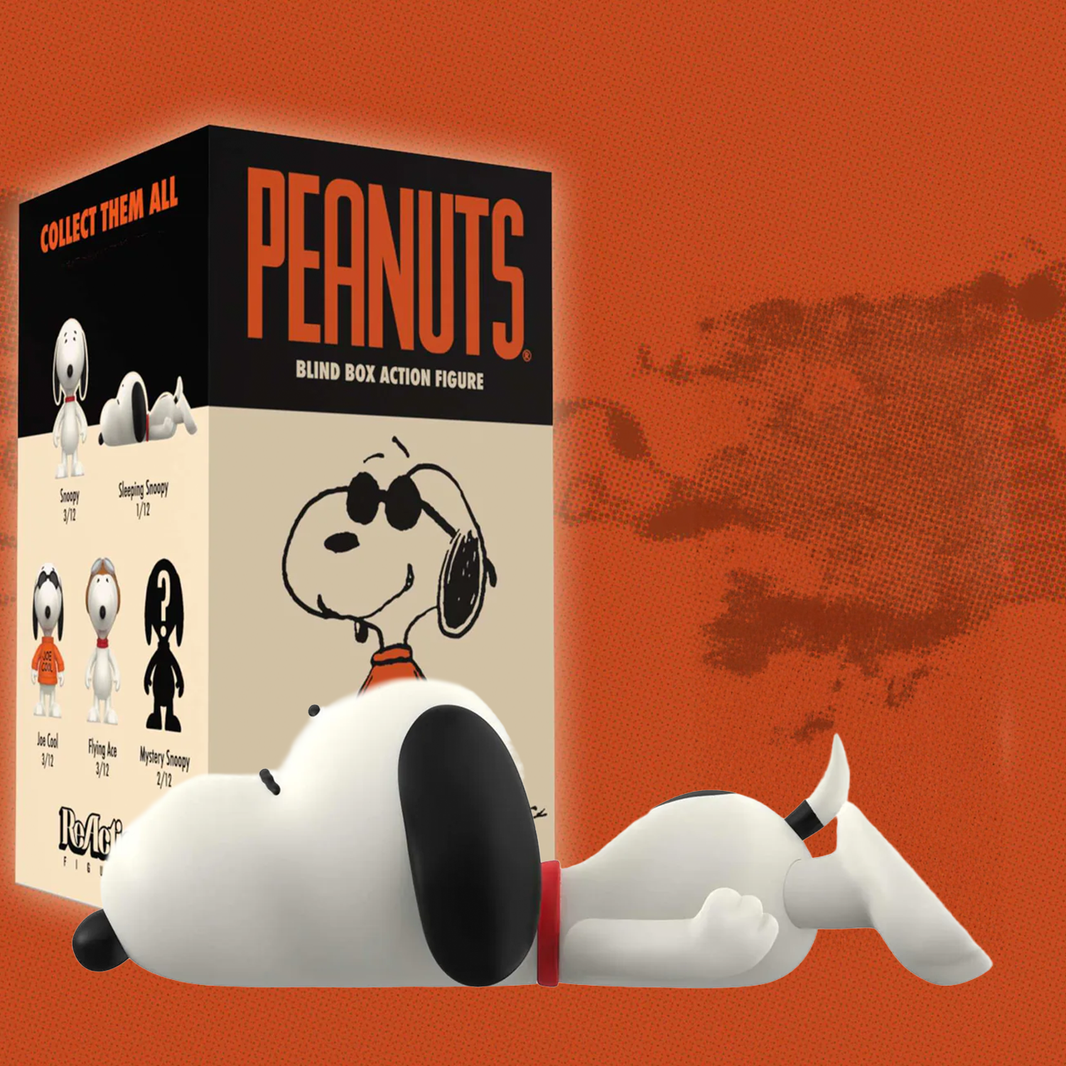 Super7 Peanuts ReAction 3.75-inch figure featuring Snoopy lying down with classic orange and black packaging
