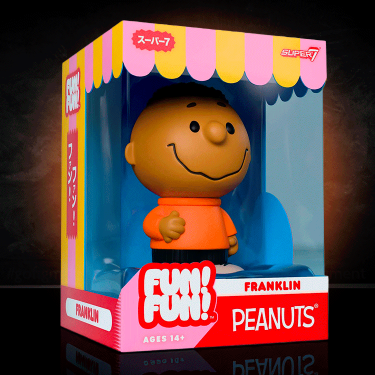 Funko Franklin vinyl figure from Peanuts Fun Fun collection standing in colorful display box with orange shirt