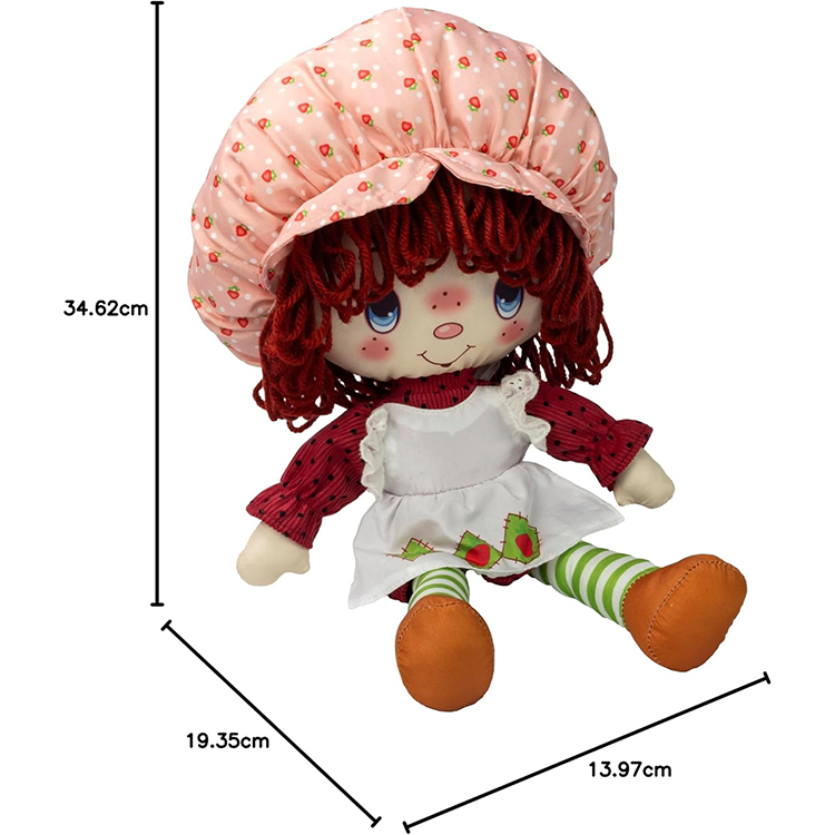 Vintage-style Strawberry Shortcake rag doll by Loyal Subjects with soft yarn hair and strawberry-themed outfit