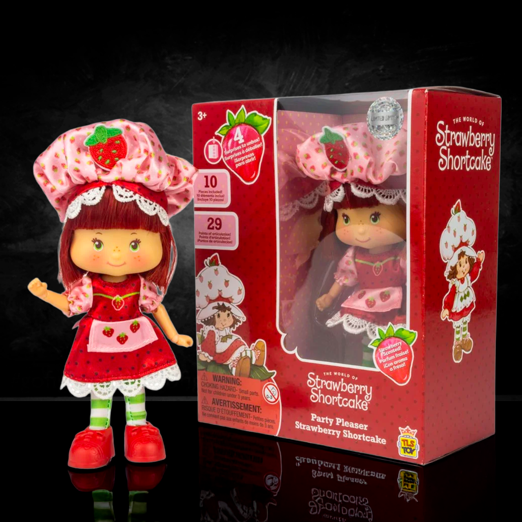 5 1/2-inch Loyal Subjects Strawberry Shortcake Party Pleaser Outfit doll with red dress and pink hat in window box packaging
