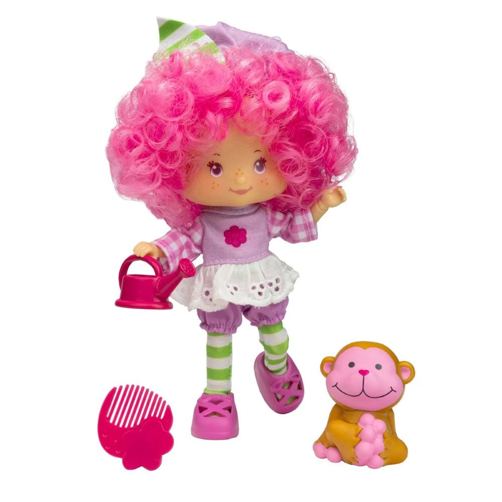 Loyal Subjects Strawberry Shortcake Raspberry Tart 5 1/2-inch doll with watering can, comb, and monkey accessory