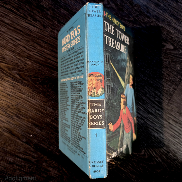 Vintage 1959 hardcover edition of The Tower Treasure, Hardy Boys Mystery #1 with blue spine by Grosset & Dunlap