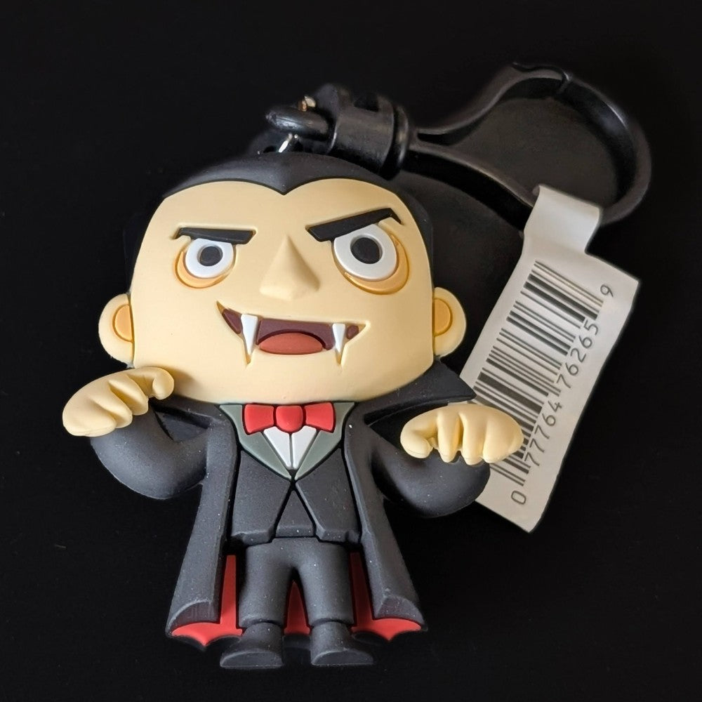 Go Figment Universal Monsters Series 4 Dracula figure 3D foam collectible bag clip with attached keyring on black background