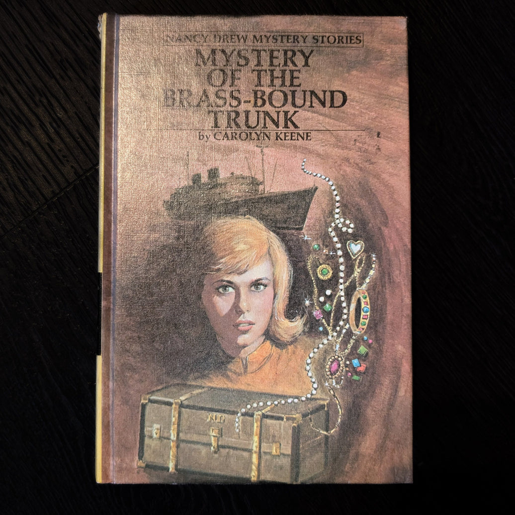 17 The Mystery of the Brass-Bound Trunk Nancy Drew Mystery Books -1976 image 0