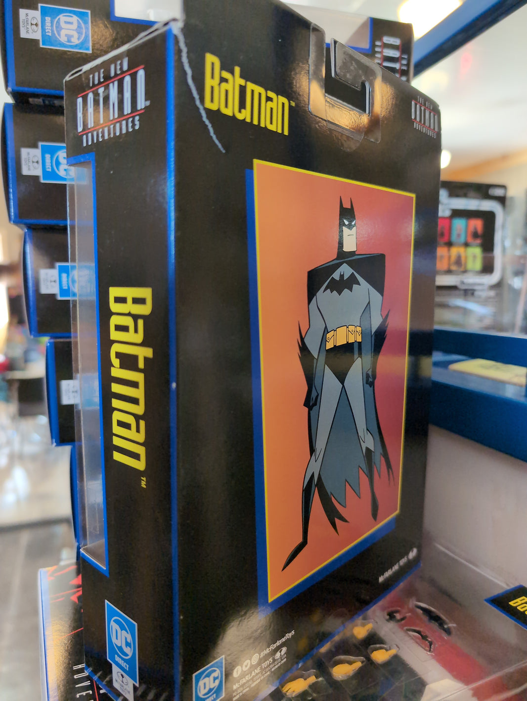 McFarlane DC The New Batman Adventures 1/12 scale action figure packaging featuring animated Batman art