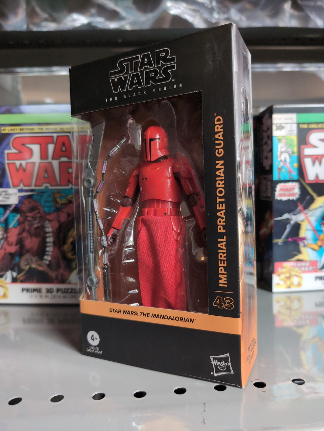 Hasbro Star Wars Black Series Imperial Praetorian Guard action figure in sealed collector packaging on display shelf.