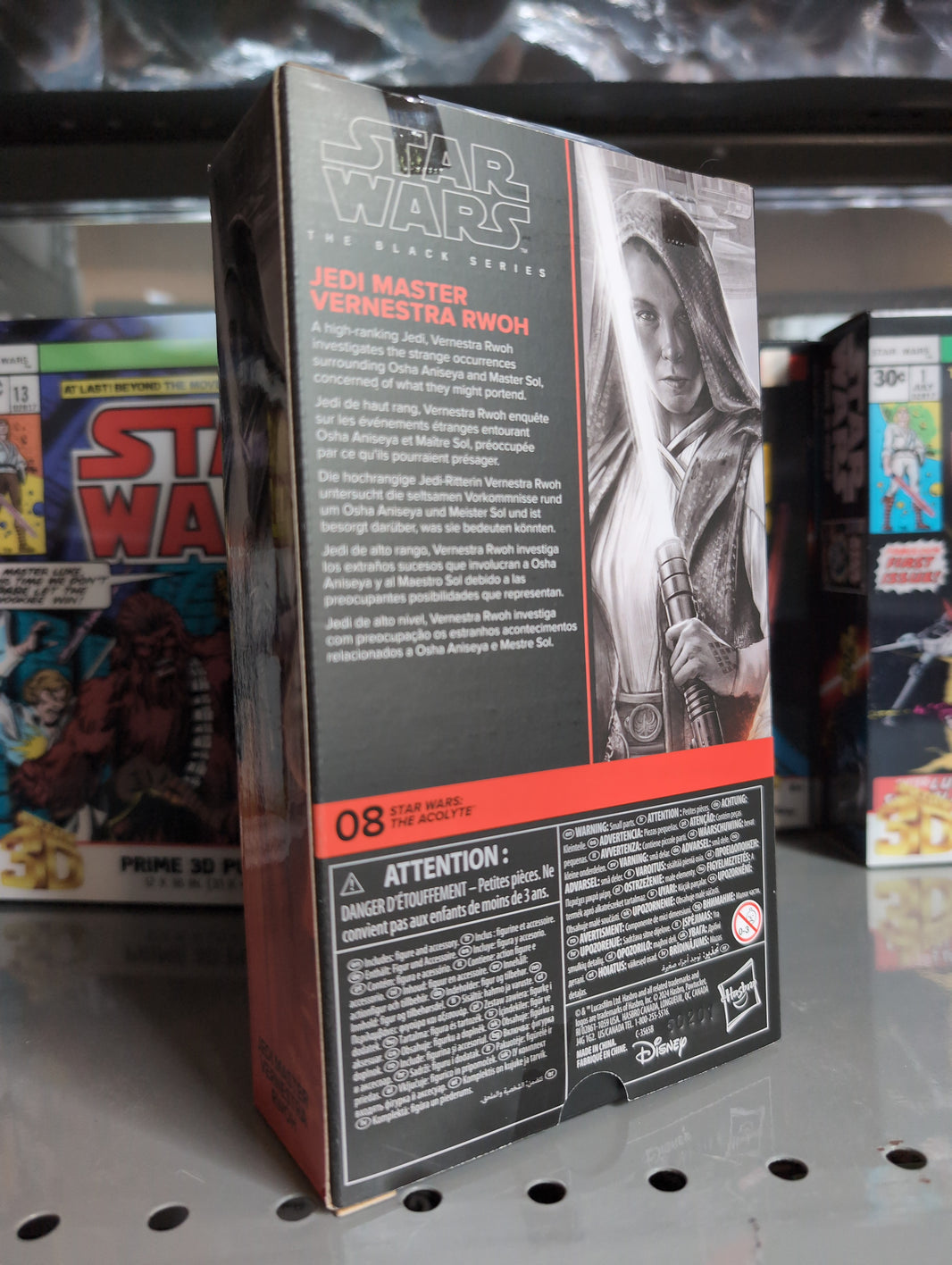 Back of Hasbro Star Wars Black Series Vernestra Rwoh Jedi Master action figure packaging with description text and artwork