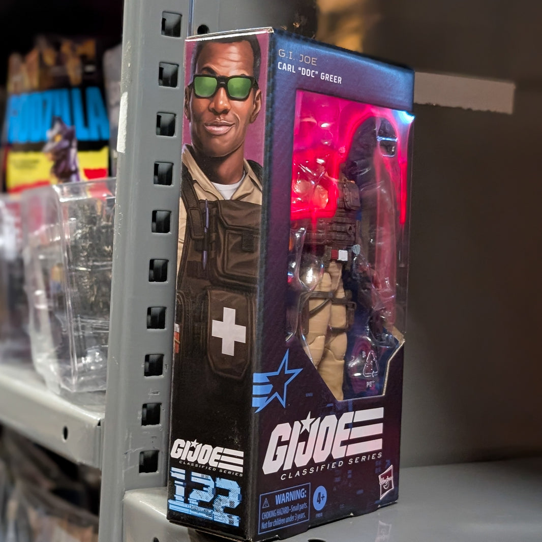 Hasbro GI Joe Classified Series Carl Doc Greer 6-inch action figure in packaging displayed on metal shelf