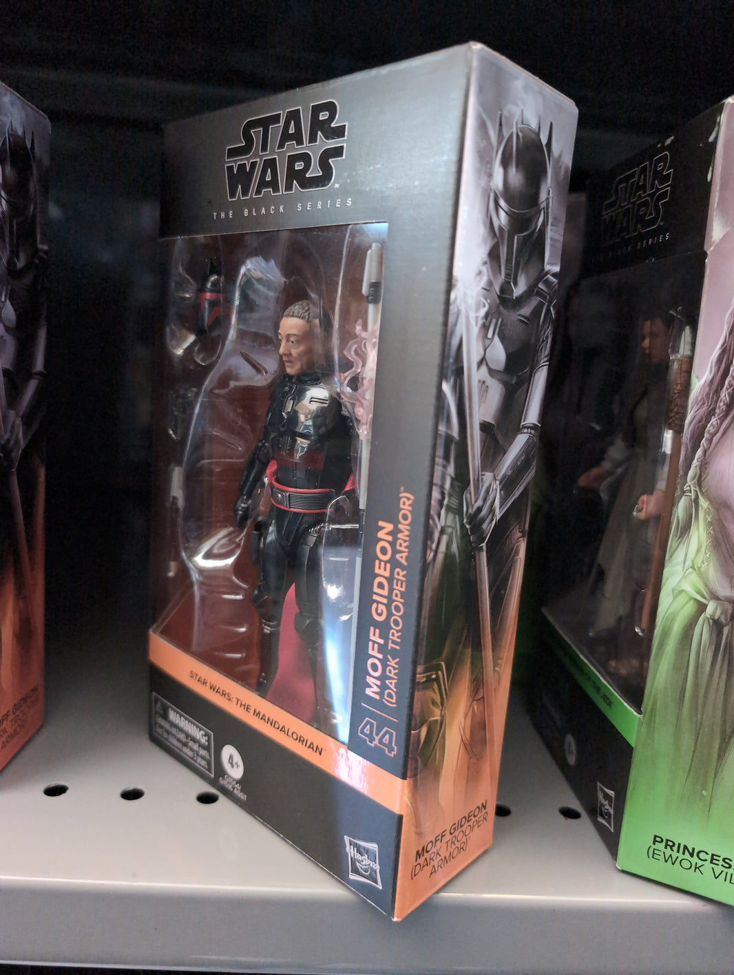Hasbro Star Wars Black Series Moff Gideon Dark Trooper Armor 6-inch action figure in packaging on display shelf