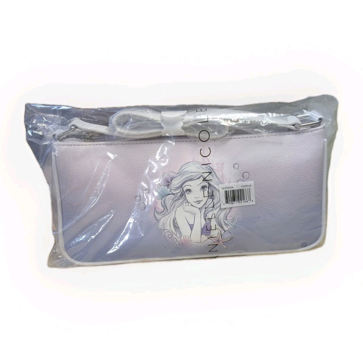 Danielle Nicole soft purple crossbody bag with Ariel illustration in clear protective packaging and barcode visible