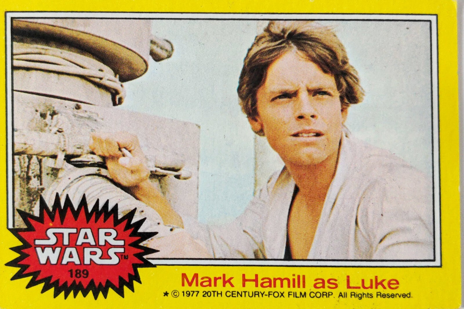 Vintage Star Wars trading card featuring Mark Hamill as Luke Skywalker in a 1977 film scene